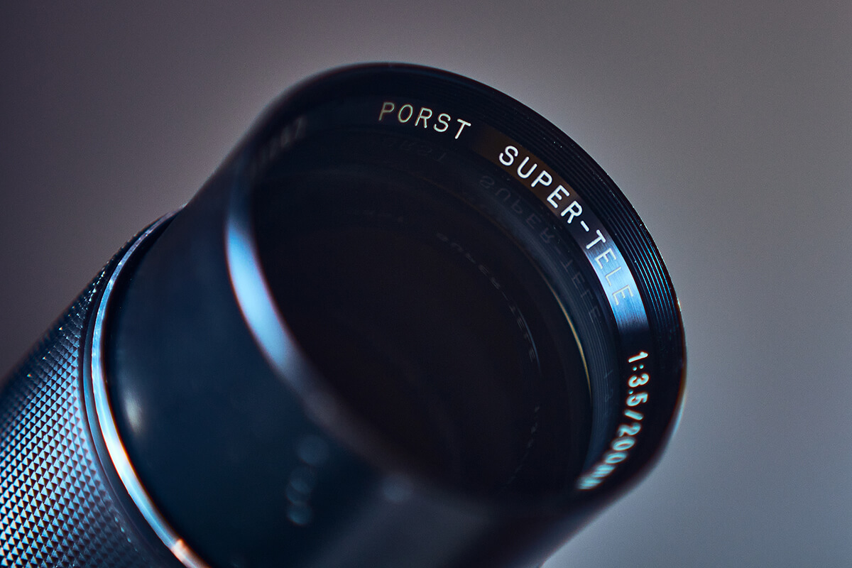 Porst Teleobjektiv an moderner Kamera